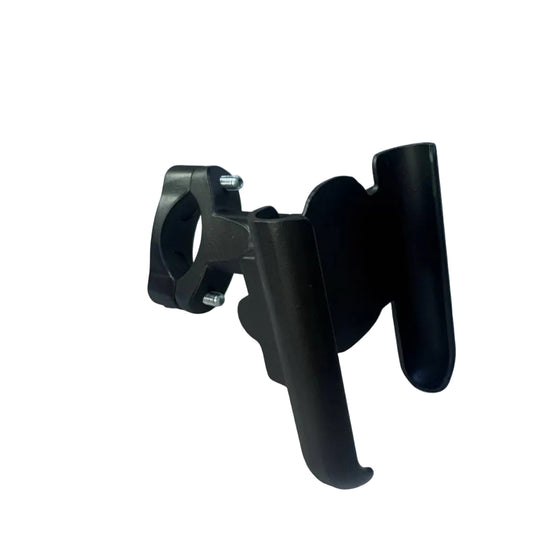 Black phone holder on a white surface with a computer monitor in the background